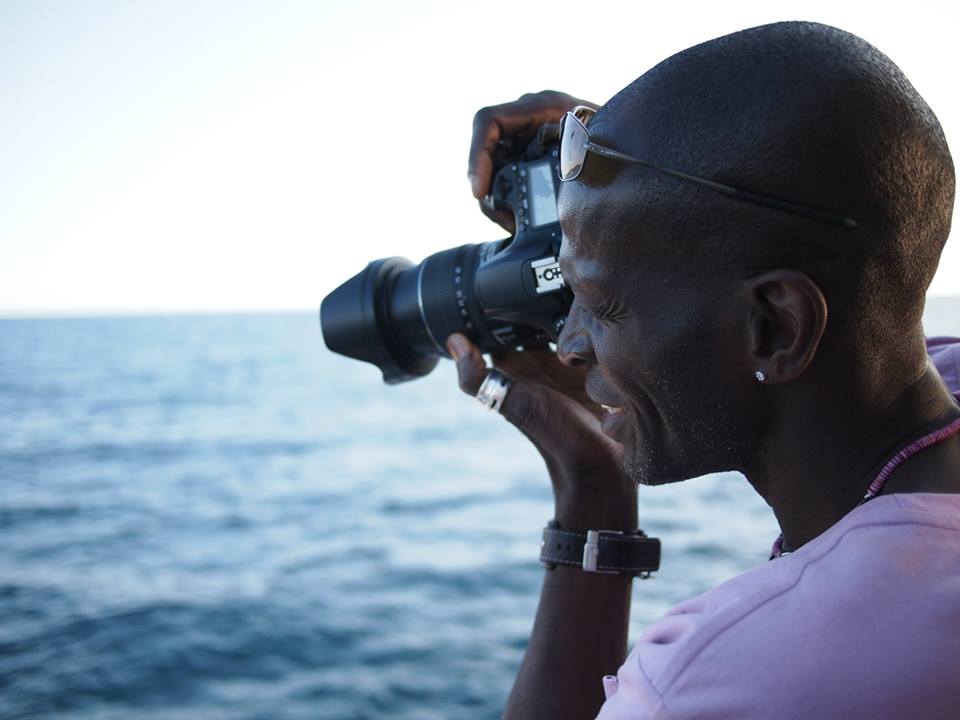 Photographer in action — with Olu Olu by Harry Limsky